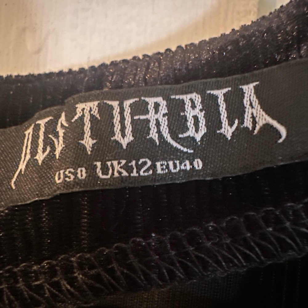 Disturbia Legacy Zip Front Midi Dress
Size 8 - Picture 6 of 7